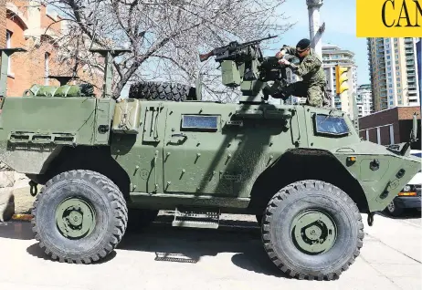  ?? JIM WELLS / POSTMEDIA NEWS FILES ?? A newly delivered Tactical Armoured Patrol Vehicle is displayed outside the Mewata Armoury in Calgary last April. The $600-million fleet has experience­d technical issues with suspension and steering, as well as tipping and rollover problems and even fires.