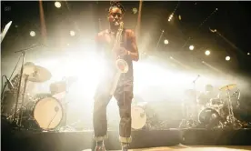  ??  ?? Have you got a work permit? … Shabaka Hutchings of Sons of Kemet performing at the Roskilde festival in Denmark. Photograph: Gonzales Photo/Alamy Stock Photo
