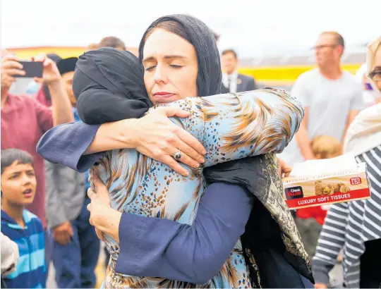  ?? Photo / Getty Images ?? Naima Abdi embraces Prime Minister Jacinda Ardern in a picture that bounced around the world.