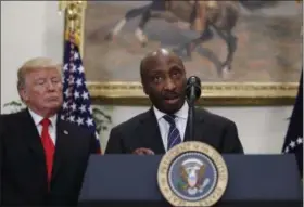  ?? THE ASSOCIATED PRESS ?? President Donald Trump listens as Merck CEO Ken Frazier speaks in the Roosevelt Room of the White House in Washington.