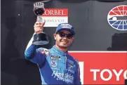  ?? Getty Images/TNS — Maddie Meyer ?? In the midst of a resurgent season, Kyle Larson guaranteed himself a ride with Hendrick Motorsport­s through 2023.