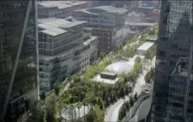  ?? ERIC RISBERG — THE ASSOCIATED PRESS ?? Shown is the roof area of the Salesforce Transit Center above where fissures have been found in the ceiling of the third level bus deck Wednesday, Sept. 26, 2018, in San Francisco.