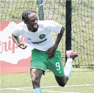  ?? PHOTO BY IAN ALLEN ?? Vere United’s Ricardo Messam celebrates after scoring the first of his two goals in their 3-1 win over Clarendon rivals Humble Lion in the Jamaica Premier League at the UWI/JFF Captain Horace Burrell Centre of Excellence on Sunday.