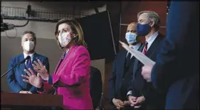  ?? .STEFANI REYNOLDS / THE NEW YORK TIMES ?? Speaker of the House Nancy Pelosi, D-Calif., center, an early proponent of a special commission to fully investigat­e the Sept. 11, 2001, attacks, is calling for a special panel to scrutinize the Jan. 6 Capitol riot.