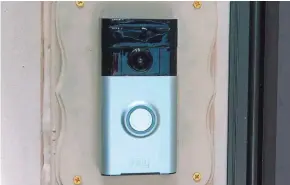  ?? ASSOCIATED PRESS ?? A Ring doorbell camera is shown at a home in Coon Rapids, Minn.