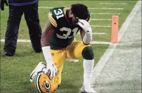  ?? Morry Gash / Associated Press ?? The Packers’ Adrian Amos pauses after losing the NFC championsh­ip game to the Buccaneers on Sunday.