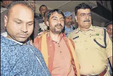  ?? PTI ?? Police arrest Arijit Shashwat, son of Union MOS Ashwini Kumar Choubey, in Patna on Sunday.