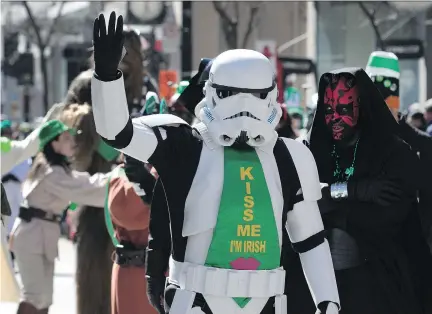  ?? ALLEN MCINNIS ?? Star Wars characters are Irish for the day: tens of thousands lined Ste-Catherine St. on Sunday for the annual St. Patrick’s parade.