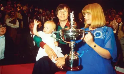  ?? Photograph: David Muscroft/ Rex Features ?? Alex Higgins, his wife Lynn, and their daughter Lauren, celebrate at the end of the 1982 WorldSnook­er final.