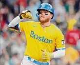  ?? Michael Dwyer / Associated Press ?? Boston’s Alex Verdugo celebrates his two-run home run against Minnesota on Saturday. He had gone 4-for-26 in spring training.