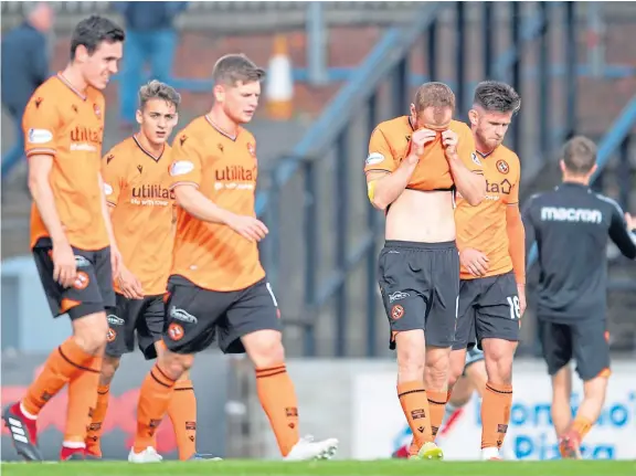  ?? Pictures: SNS Group. ?? Top: Dundee United players troop off the park after their surprise 2-0 loss away to Ayr United; opposite page: Honest Men boss Ian McCall grabbed headlines with his comments regarding Lawrence Shankland’s transfer in the summer, Jason Holt made an impressive debut for St Johnstone at Pittodrie and Dens boss James McPake has already shown he’s not afraid to make tough managerial decisions.