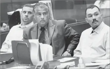  ?? Irfan Khan
Los Angeles Times ?? MARVIN NORWOOD, left, Louie Sanchez, right, and Norwood’s attorney, Victor Escobedo, listen in court Thursday. Norwood and Sanchez are charged in the beating of San Francisco Giants fan Bryan Stow last year.