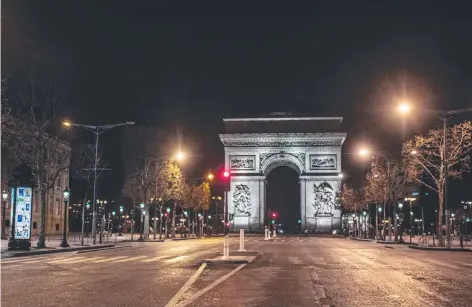 ?? Picture: AFP ?? The famous Arc de Triomphe in Paris is, like the rest of France, a ghost town as the strict coronaviru­s lockdown in the country drives the French off the streets and into their homes