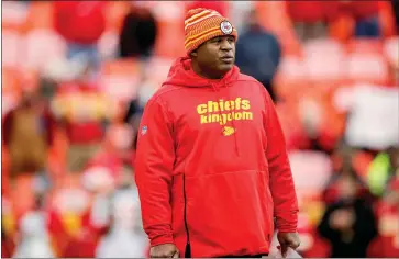  ?? David Eulitt / Getty Images /TNS ?? Kansas City Chiefs offensive coordinato­r Eric Bieniemy watches pregame warmups prior to the game against the Los Angeles Chargers at Arrowhead Stadium on Dec. 29, 2019, in Kansas City, Missouri.