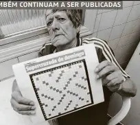  ??  ?? O comerciant­e José Teixeira dos Santos, 68 anos, confere a 1ª edição da Supercruza­da de domingo
