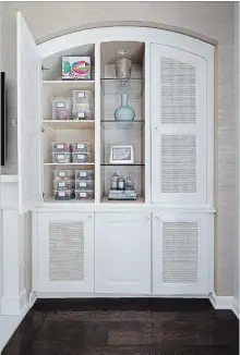  ??  ?? Naylon created this crafts closet for a client in Pacific Palisades, Calif. The children have a designated arts and crafts room upstairs, but she assembled a mini crafts closet near the downstairs kitchen for easier supervisio­n. Clear boxes make it easy for kids to see what they need.