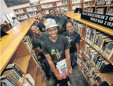  ?? Picture: Alaister Russell ?? Ntokozo Ndlovu, front, started the Siyafunda Donate a Book fund, which has distribute­d 21,450 books to 37 rural schools and community libraries, reaching more than 11,000 children.