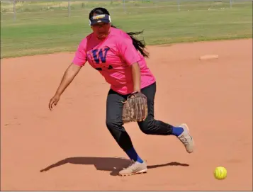  ?? Buy these photos at YumaSun.com PHOTOS BY BRIAN FOGG/YUMA SUN ?? SAN PASQUAL’S SARAH GILMORE reaches out for a ground ball down the third-base line in the second inning against Anthem Prep on Thursday afternoon. Gilmore and the Warriors fell 8-4 in the game.