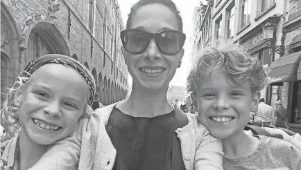  ?? PROVIDED BY CHRISTINE SARKIS ?? Christine Sarkis takes a photo with with her children in Bruges, Belgium.