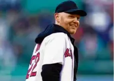  ?? CHARLES KRUPA/AP/FILE ?? Bill Burr threw out the first pitch at a Red Sox game at Fenway Park in April of 2022.