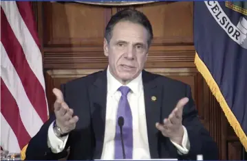  ?? Office of the New York Governor via AP ?? New York Gov. Andrew Cuomo said Wednesday in Albany, N.Y.: ‘I now understand that I acted in a way that made people feel uncomforta­ble. It was unintentio­nal and I truly and deeply apologize for it.’