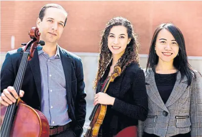  ?? BEDFORD TRIO ?? The Bedford Trio, featuring Andrew Ascenzo, Alessia Disimino and Jialiang Zhu, perform Xenia Concerts for children with autism.