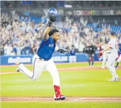  ?? AFP ?? The Blue Jays’ Vladimir Guerrero Jr celebrates his walk-off hit single in the ninth inning to defeat the Red Sox at the Rogers Centre in Toronto.