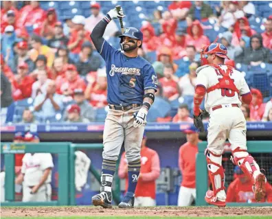  ?? ERIC HARTLINE/USA TODAY SPORTS ?? Jonathan Villar strikes out during the sixth inning against the Phillies on Sunday. Villar had a single in four at-bats, but also left three men on base.