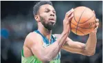  ?? DAVID SHERMAN GETTY IMAGES ?? Timberwolv­es forward Andrew Wiggins had 18 points and 10 rebounds against the Raptors on Saturday.