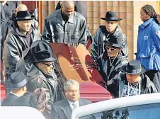  ?? — AFP file photo ?? The coffin of Run DMC’s Jam Master Jay, nee Kevin Mizell, is carried out of Allen A.M.E Cathedral after his funeral Nov 5, 2002.