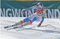 ?? ASSOCIATED PRESS FILE PHOTO ?? The United States’ Lindsey Vonn competes in 2017 during the women’s World Cup downhill at the Jeongseon Alpine Center in Jeongseon, South Korea. Older Olympians credit consistenc­y, better knowledge of nutrition and agewon wisdom for the longevity of...