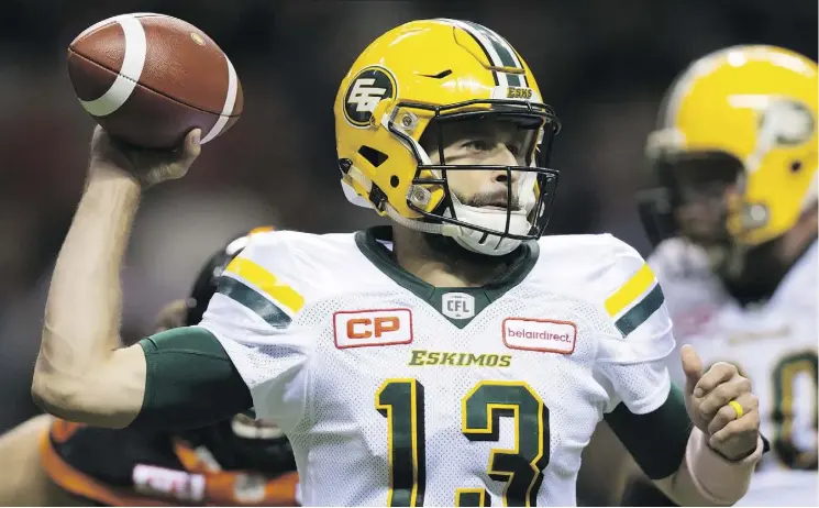  ?? DARRYL DYCK/THE CANADIAN PRESS ?? Eskimos quarterbac­k Mike Reilly is one of two players remaining in head coach Jason Maas’ BONE Crushers Club with lineman Matt O’Donnell.