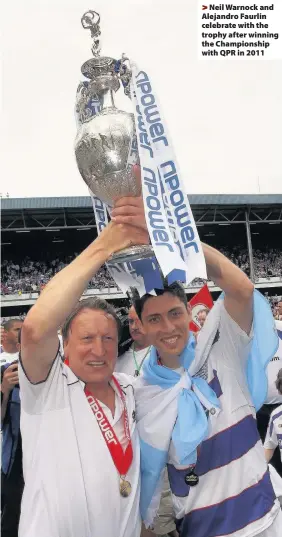  ??  ?? > Neil Warnock and Alejandro Faurlin celebrate with the trophy after winning the Championsh­ip with QPR in 2011