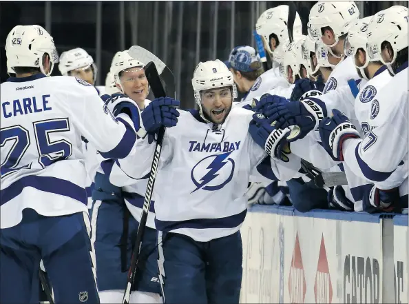  ?? — GETTY IMAGES ?? Tampa Bay Lightning centre Tyler Johnson celebrates his third goal of the game against the New York Rangers on Monday in New York. Tampa Bay won 6-2 to tie the series 1-1. Johnson was the playoff scoring leader with 16 points heading into Tuesday’s...