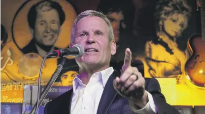  ?? MARK HUMPHREY/AP ?? Tennessee Gov. Bill Lee, at a bill-signing event Thursday in Nashville, says that artists “have a uniqueness that is theirs and theirs alone, certainly not artificial intelligen­ce.”