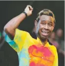  ?? PHOTO BY ROB GRABOWSKI/INVISION/AP ?? Tyler, The Creator performs on day two at Lollapaloo­za in Grant Park in Chicago in 2018.