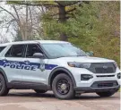  ?? MYKAL MCELDOWNEY/INDIANAPOL­IS STAR ?? A Carmel, Ind., officer blocks the road to former Vice President Mike Pence’s house with his vehicle Friday.