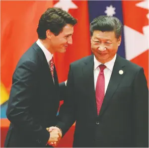  ?? DAMIR SAGOLJ / REUTERS FILES ?? Prime Minister Justin Trudeau shakes hands with Chinese President Xi Jinping at a G20 Summit meeting.