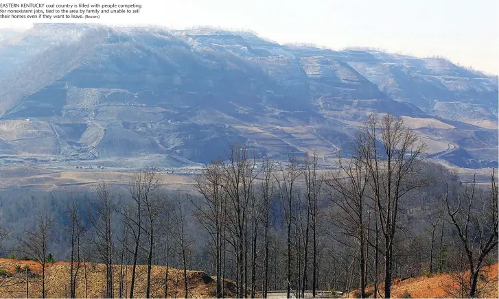  ?? (Reuters) ?? EASTERN KENTUCKY coal country is filled with people competing for nonexisten­t jobs, tied to the area by family and unable to sell their homes even if they want to leave.