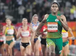  ?? Saeed Khan AFP/Getty Images ?? CASTER SEMENYA competes in 2018. The federation governing track and field determined that she possessed both male and female characteri­stics.