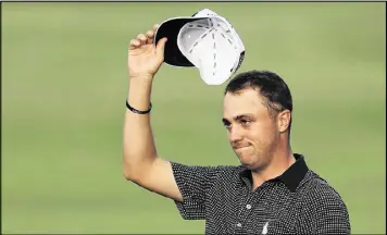  ?? SAM GREENWOOD / GETTY IMAGES ?? Justin Thomas turned the Sony Open in to a battle for second place after his openingrou­nd 59. He finished 27-under to win by seven strokes.