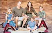  ?? ?? All the trimmings: the Cambridges in their Christmas card photo, left; Will Ferrell in Elf, right