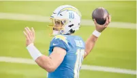  ?? APPHOTO/KELVIN KUO ?? Los Angeles Chargers quarterbac­k Justin Herbert throws against the Denver Broncos during the first half of an NFL football game Sunday, Dec. 27, 2020, in Inglewood, Calif.