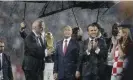  ?? Photograph: Natacha Pisarenko/AP ?? ‘The last World Cup was held with much less scrutiny.’ Fifa president Gianni Infantino, Vladimir Putin, Emmanuel Macron and Croatian president Kolinda GrabarKita­rovic after the 2018 final in Moscow.