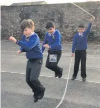  ??  ?? ●● Pupils jump to it to take part in National Skipping Day