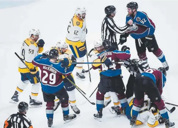  ?? AAron Ontiveroz, The Denver Post ?? As has happened a lot so far in this series, the Avalanche and Predators mix it up after the whistle during the first period of Monday night’s Game 3 of the Western Conference playoff series. Colorado’s win ensures there will be a Game 5.