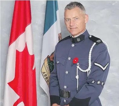  ?? HO - ABBOTSFORD POLICE DEPARTMENT / THE CANADIAN PRESS ?? Abbotsford police Const. John Davidson died while responding to a report of a possible stolen vehicle Monday. Davidson began his career as an officer in the United Kingdom 24 years ago and started work for the Abbotsford police in 2006.