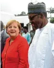  ?? Foto: afp ?? Kanzlerin Merkel mit dem nigeriani schen Präsidente­n Buhari.