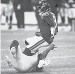  ?? ARMANDO L. SANCHEZ/CHICAGO TRIBUNE ?? Vita Vea sacks Bears quarterbac­k Nick Foles in October at Soldier Field in Chicago.