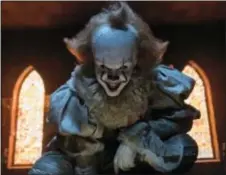  ?? ASSOCIATED PRESS ?? This image released by Warner Bros. Pictures shows Bill Skarsgard in a scene from “It.”